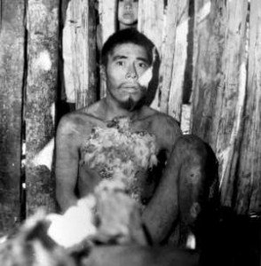 Aché man shortly after he was captured and brought out of the forest to the Aché Reservation. Paraguay, 1972. © A. Kohmann/Survival