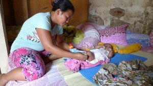 In Surabaya - she is too poor to fly, but she matters, too! -- photo Andre Vltchek