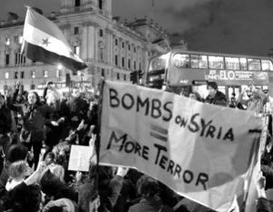 Nov. 28, 2015. In London hundreds of demonstrators gathered outside Downing Street, where the Prime Minister has offices, to denounce the British government’s decision to continue bombing Syria. Photo: Alisdare Hickson on Flickr